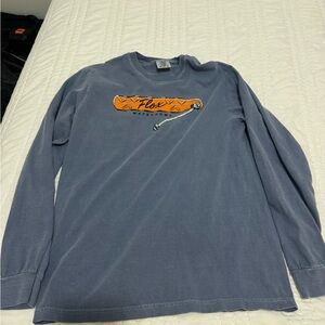 Blue Long Sleeve Shirt with Orange Logo